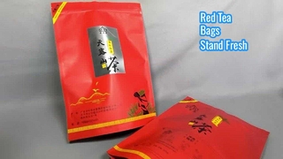 Borsa rossa autoportante con chiusura a zip per tè nero