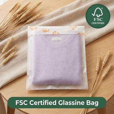 Sacco di carta glassine di lusso sostenibile per abbigliamento Custodia per indumenti per imballaggio di indumenti biodegradabili senza plastica per sfusi certificati